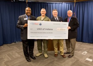 From left to right: Jim Pridgin of the USO, Col. Patrick Renwick of the 122nd Fighter Wing, Charles Ridings of the USO and Bob Legacy of the USO.